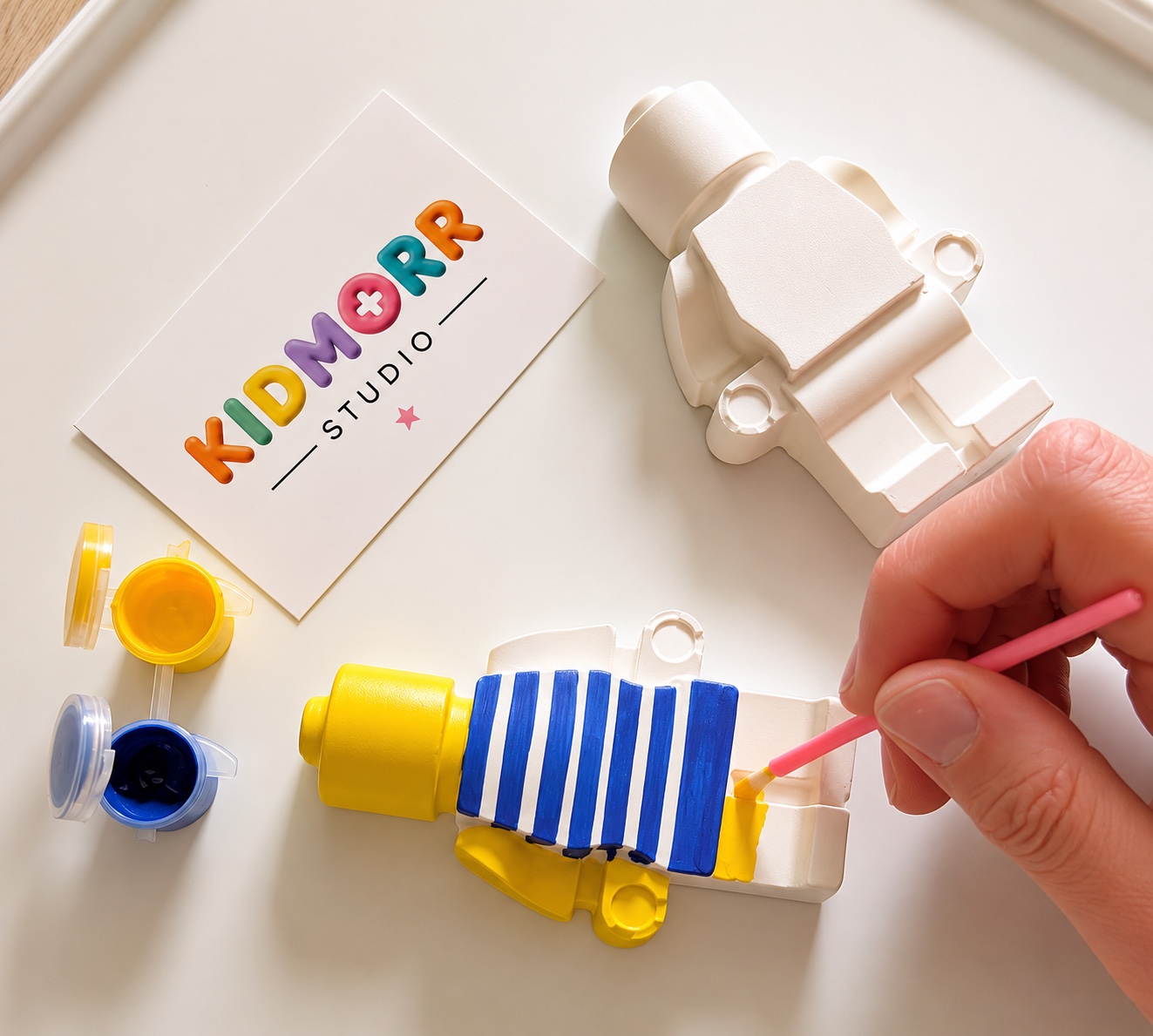 Kidmorr Studio paint-your-own figurine kit